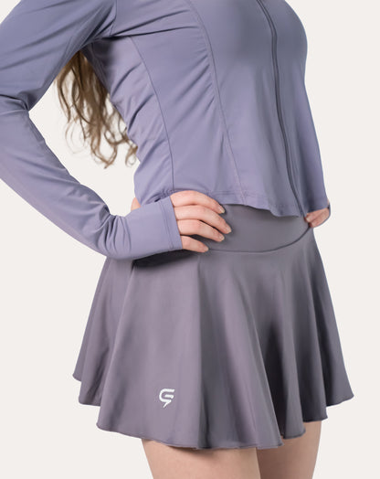 Close left-side panel and seam detail of the lavender women’s fitness jacket