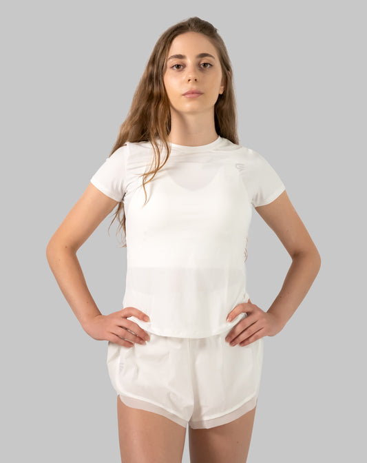 Women's gym set in white, model wearing tee and curved-hem 2-in-1 shorts