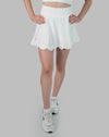 Women’s gym skirt set in white, close-up of flared scalloped skirt