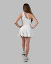 Women’s gym skirt set in white, back view with flared mini skirt