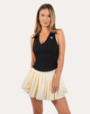Black womens gym tank top, full-length front view with collared V-neck