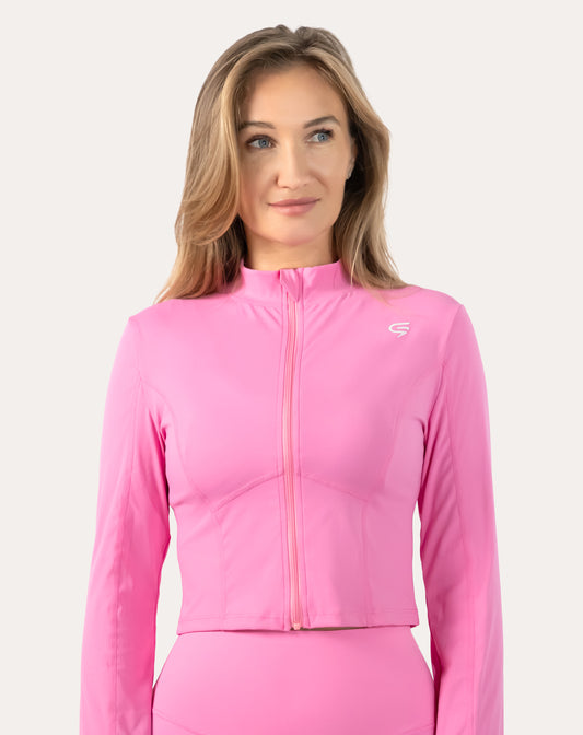 Front waist-up view of the women’s pink cropped zip-up jacket with stand collar