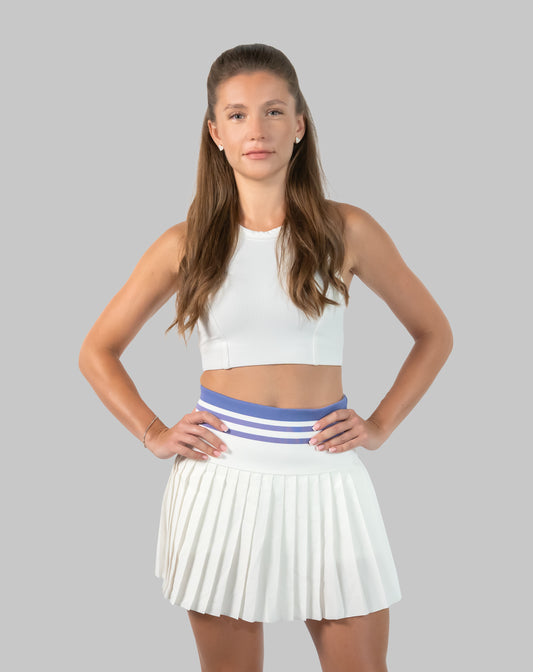 Women’s tennis skirt set in white, front view ribbed crop and pleated skirt